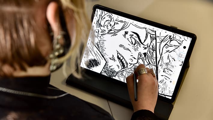Graphic Design student in Art Centre on the Priestley College campus.