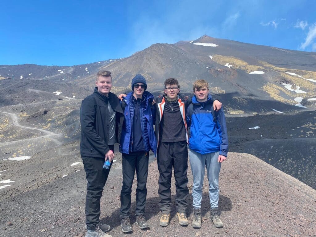Image of students at summit of volcano